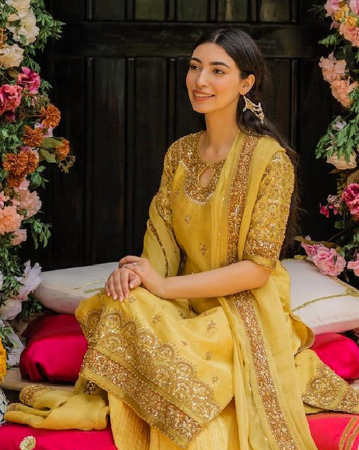 Neha Sharma in a yellow sharara suit | Fashionworldhub